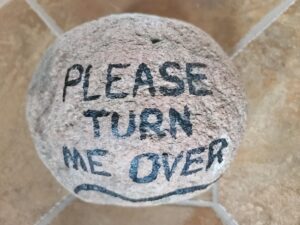 rock painted with a message