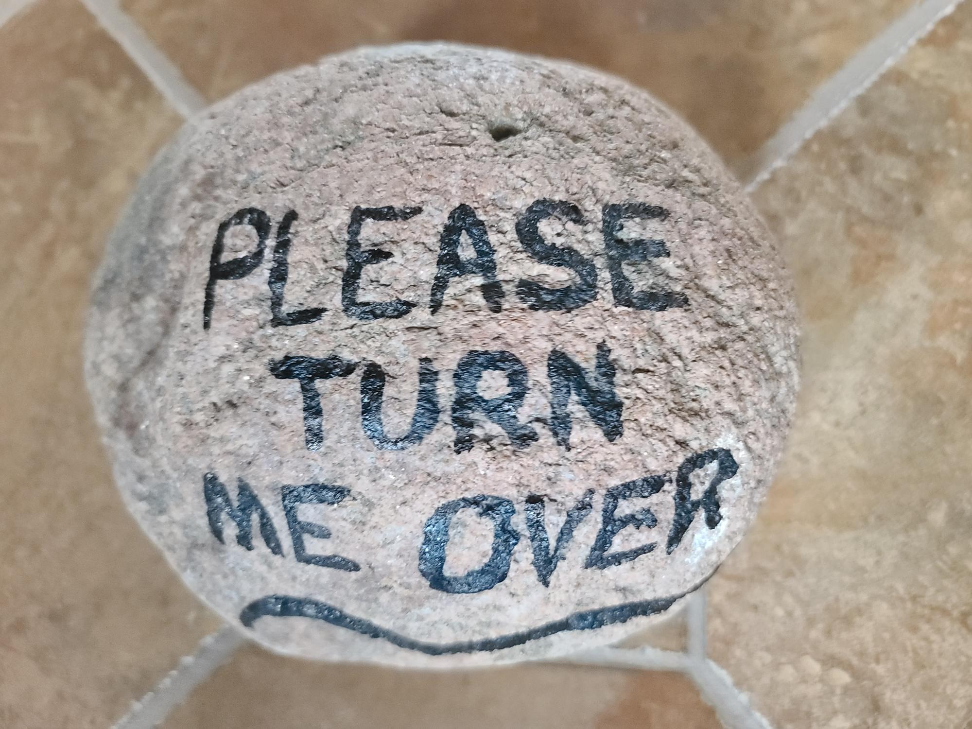 rock painted with a message