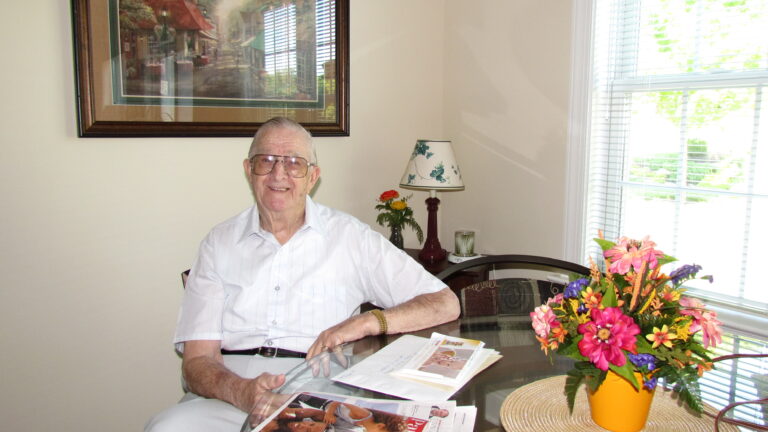 father sitting at a table